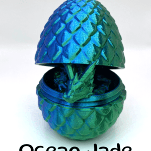 Green / Blue Metallic Dragon Egg with a small Dragon Fidget Toy Peaking From Inside