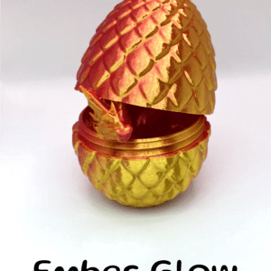 Red / Gold Metallic Dragon Egg with a small Dragon Fidget Toy Peaking From Inside