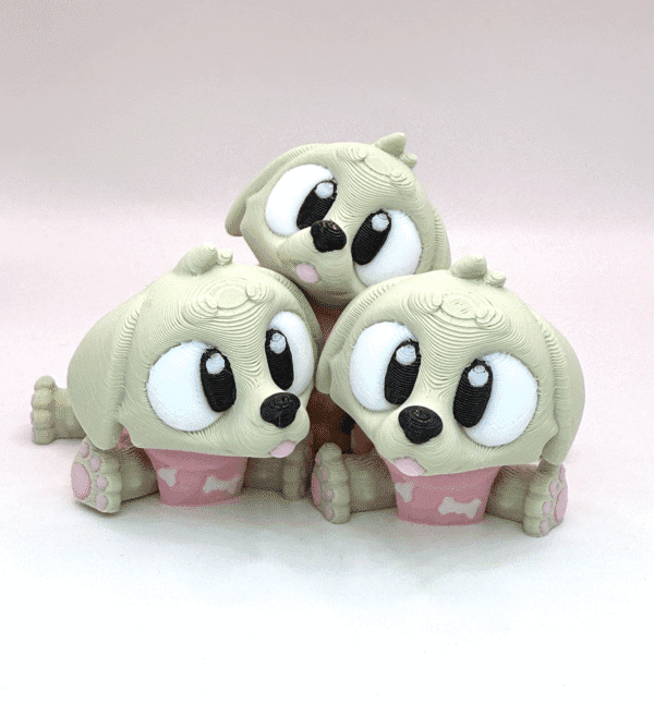 Buddy The Golden Retriever Flexi Fidget Children's Toy piled on top of each other